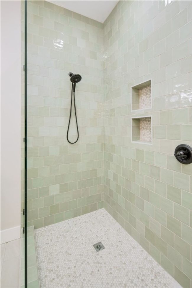 Full bath featuring tiled shower | Image 14