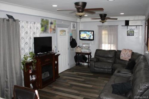 94 Woods Ave, Roosevelt, NY, 11575-1743 | Card Image