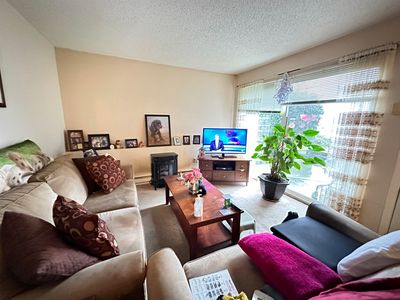 1 - 319 Highland Way, Townhouse with 3 bedrooms, 1 bathrooms and 2 parking in Port Moody BC | Image 1