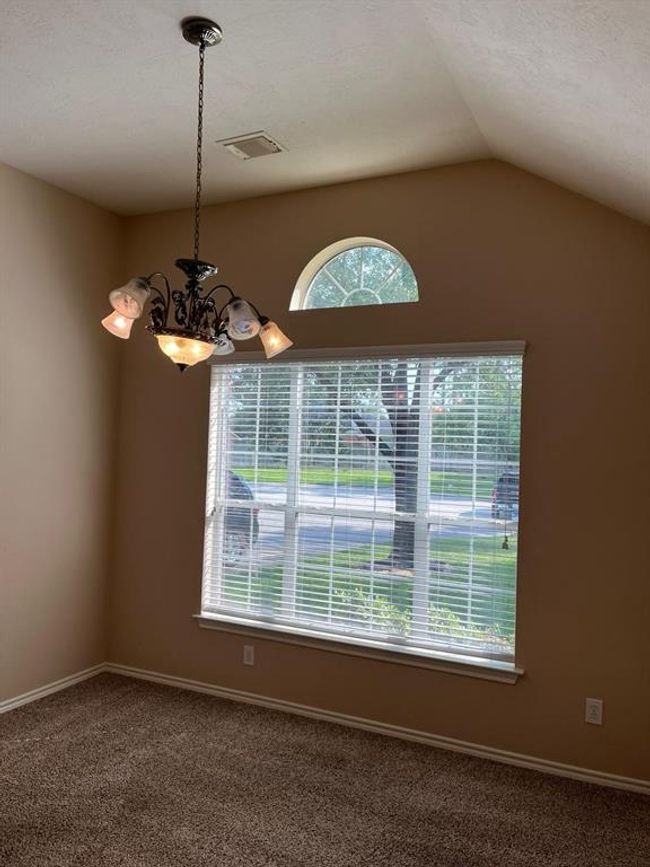 Formal Dining Area with Natural Lighting | Image 6