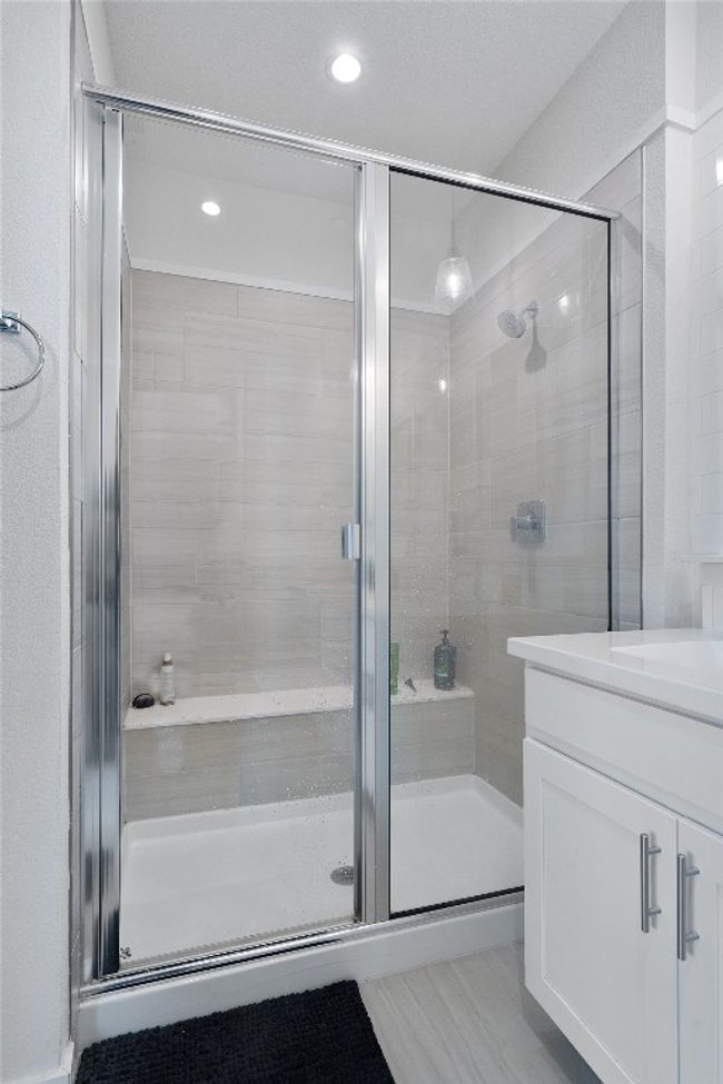 Full bath featuring vanity, a shower stall, and recessed lighting | Image 29