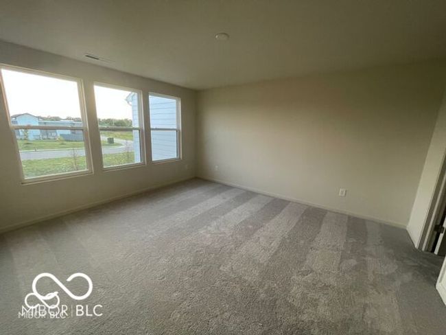 empty room featuring carpet flooring and baseboards | Image 13