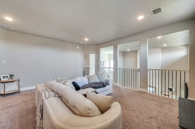 Living room with visible vents, recessed lighting, and carpet | Image 22