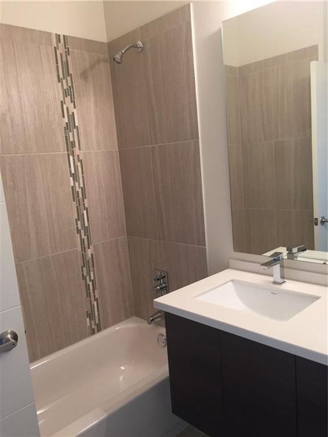 Full bath with vanity and shower / washtub combination | Image 4