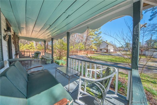 Wooden deck featuring a porch | Image 4