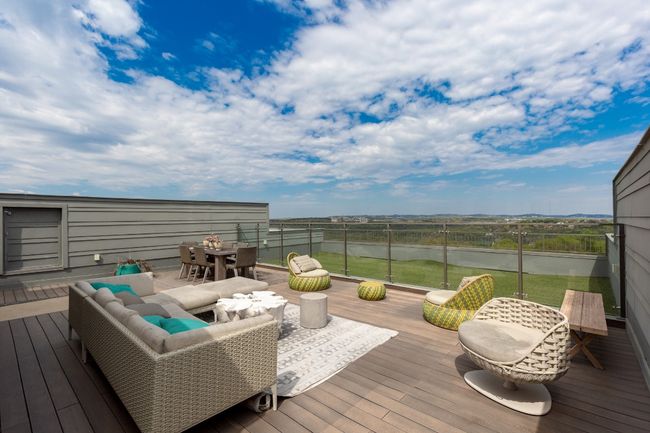 Deck with outdoor dining area and outdoor lounge area | Image 8