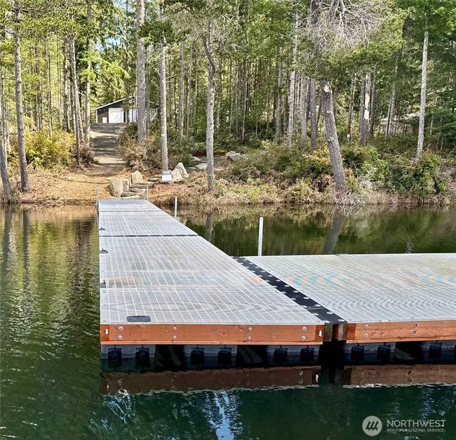 This gorgeous 60'x 28' dock was built in 2022. The dock platform is 28'x12.5'. It is one of the largest docks in Mason County. | Image 8