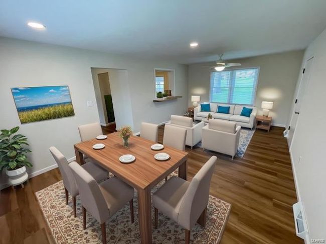 Dining space with wood finished floors, a ceiling fan, recessed lighting, and baseboards | Image 6
