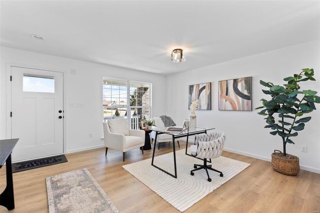 Home office featuring light hardwood / wood-style flooring | Image 8