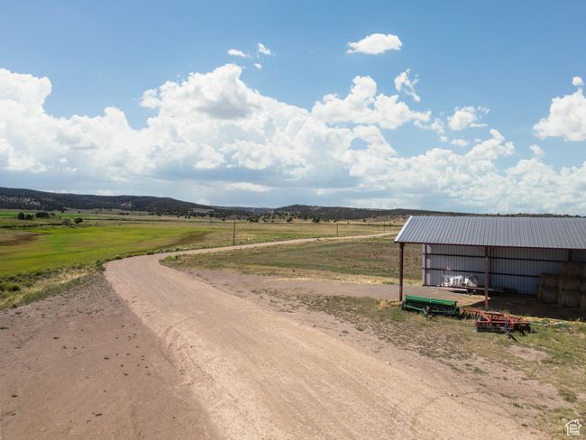 View of road featuring an outbuilding and a view of countryside | Image 8