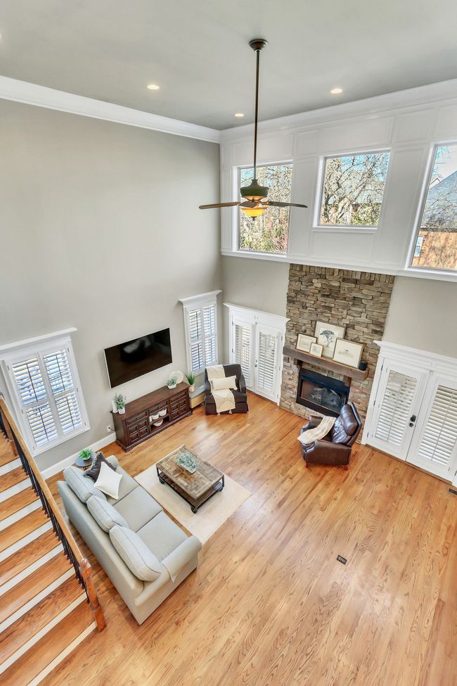 The view from above. High picture windows allow light to brighten this home. | Image 9