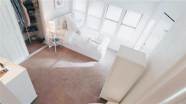 Unfurnished bedroom with carpet and a closet | Image 11