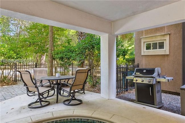 A covered lanai and private plunge pool, and grill | Image 46