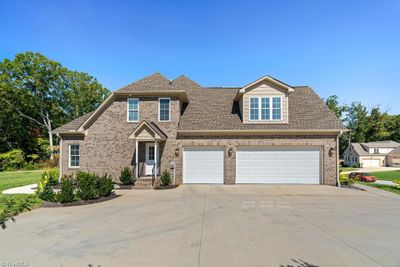 7405 Felloes Court, House other with 5 bedrooms, 3 bathrooms and null parking in Oak Ridge NC | Image 2