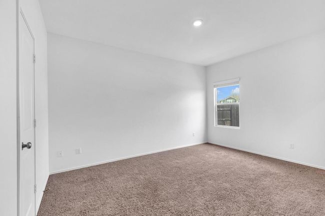Carpeted empty room with baseboards | Image 11