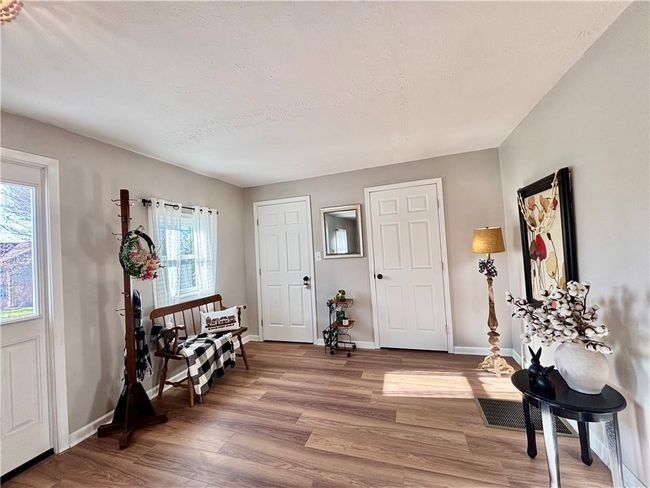 Ushers guests in style, new flooring , windows , lighting , drywall , insulation | Image 8