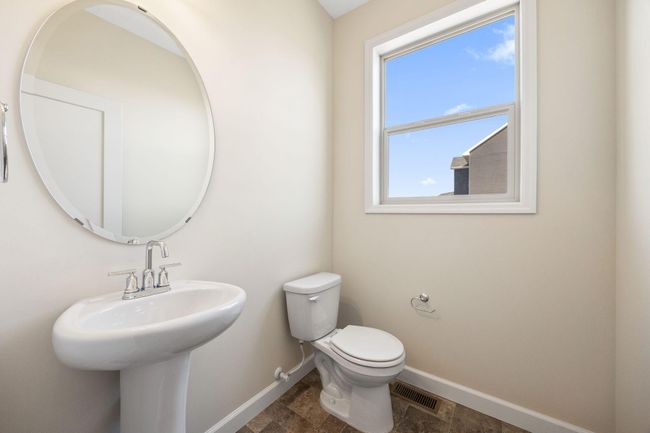 Main level half bath off kitchen | Image 17