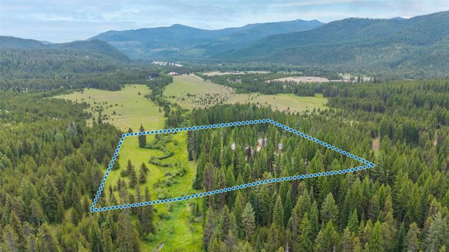 View of property location featuring property parcel outlined and a mountain backdrop | Image 7