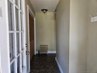 Entry way from back deck. Laundry on the left | Image 2