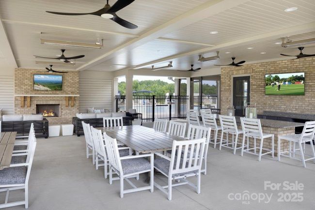 Outside Covered Porch with Fireplace and Catering Kitchen | Image 28