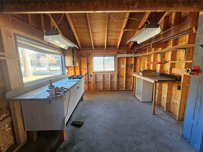 Another view of the interior of the RV garage - has workbench also. | Image 40