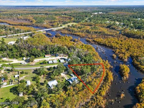 587 Texas St, Wewahitchka, FL, 32465-3932 | Card Image