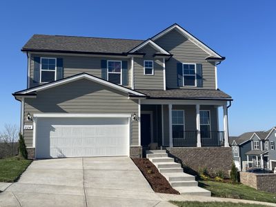 Aspire (# 158) Exterior - Upgraded! Covered Front Porch, High roof peaks and Shutters for Curb appeal! Low maintenance and durable fiber-cement siding. Natural Light throughout. Contact Sales for details. | Image 1