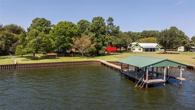 Welcome to 774 LCR 743 in Thornton, Texas. This gorgeous 1-acre property is on the open water of Lake Limestone and ready for year-round living or that second home you have always wanted. With a recently repaired dock, you can enjoy the boathouse, boating, swimming or fishing. | Image 1