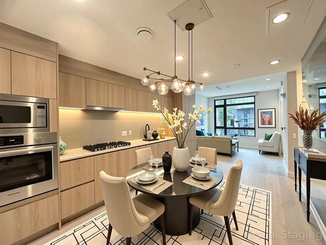Dining space featuring light wood finished floors and recessed lighting | Image 24