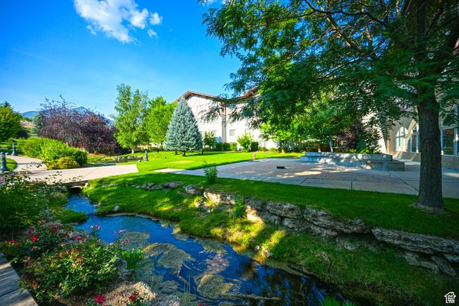 Surrounding community with a yard | Image 44