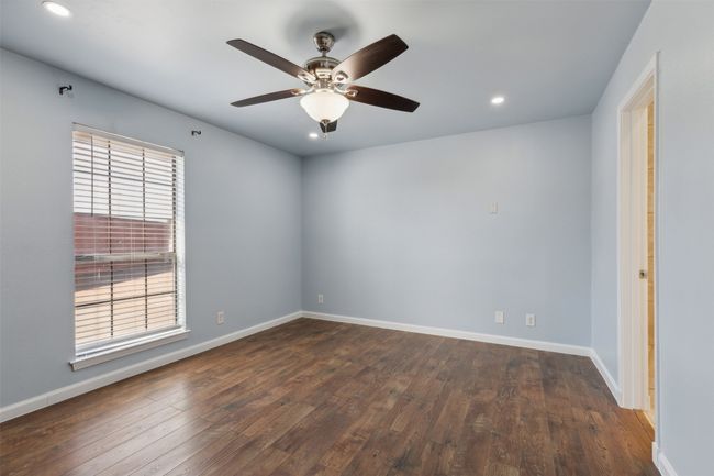 Unfurnished room featuring dark wood-type flooring, recessed lighting, and baseboards | Image 17