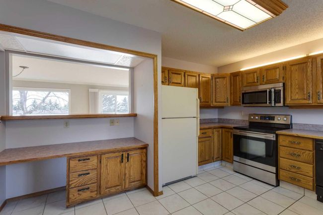38 - 118 Strathcona Road Sw, Townhouse with 2 bedrooms, 2 bathrooms and 4 parking in Calgary AB | Image 16