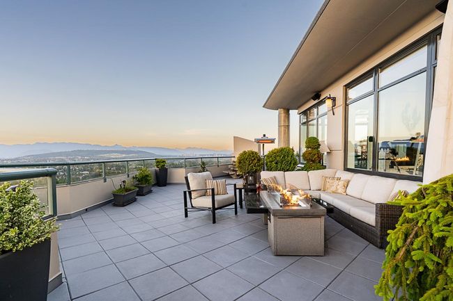 View of patio featuring an outdoor living space with a fire pit and a mountain view | Image 20