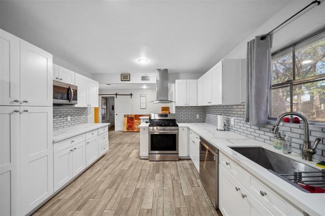 QUARTZITE KITCHEN COUNTERS AND CONNECTED ISLAND AREA | Image 14