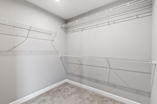 Primary Bedroom Walk-in Closet | Image 43