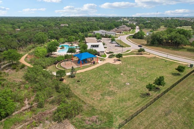 Drone / aerial view featuring a wooded view | Image 38