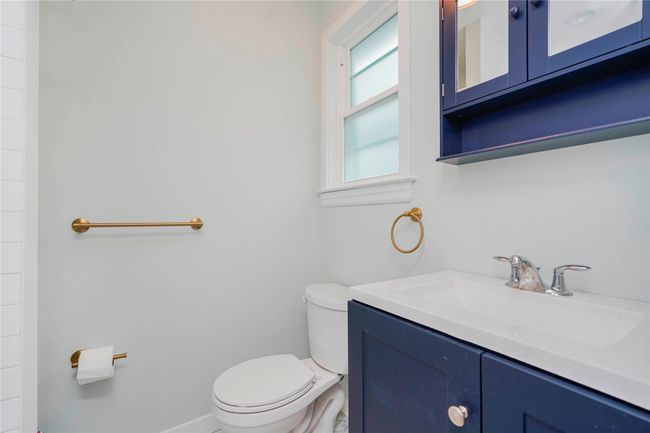 Bathroom with vanity and toilet | Image 24