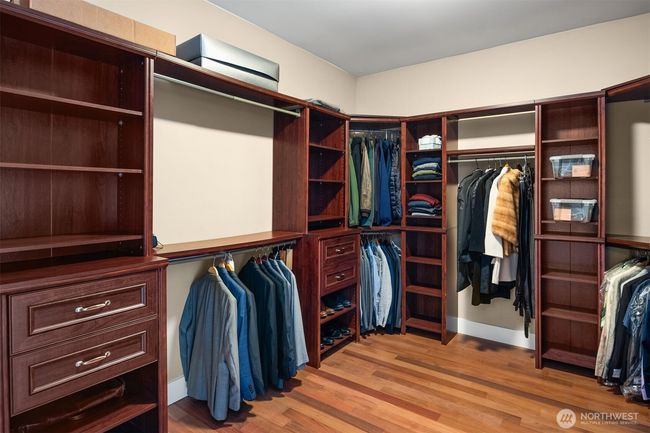 Main floor primary suite closet with built-ins | Image 16