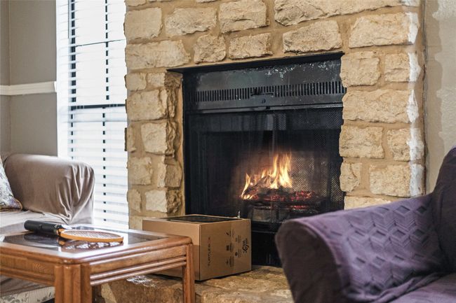 Interior details with a fireplace Unit B | Image 17