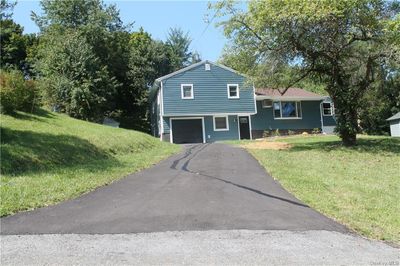 Split level home featuring a front yard | Image 2