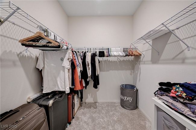 Spacious closet featuring carpet floors | Image 22