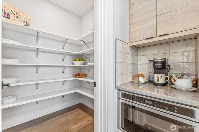 The most generous walk-in pantry for effortless storage, sleek drawer microwave and a perfect coffee bar | Image 11