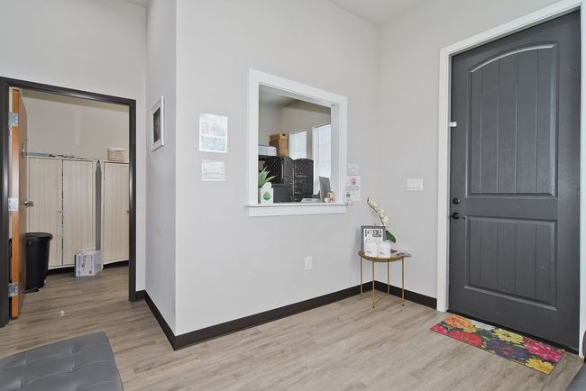 Entrance foyer with light wood-type flooring and baseboards | Image 6