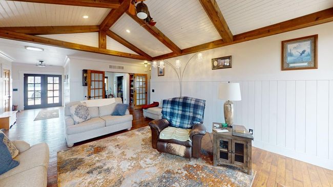 Wood beamed vaulted ceilings | Image 5