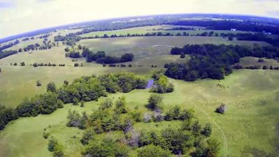 Birds eye view of property with a water view and a rural view | Image 1