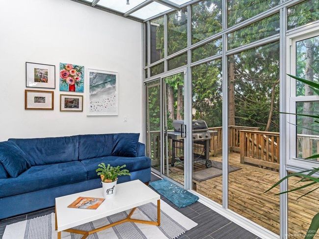 Forest and sun bathe in your x-large sun drenched solarium, inviting morning and afternoon east and southern sunshine into your home, with breathtaking views and ultra privacy thanks to a backdrop of trees creating a wall of privacy. | Image 19
