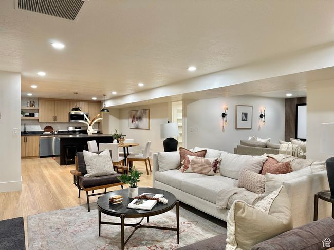 Living area featuring recessed lighting and light wood-type flooring | Image 30