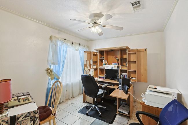 Private office with a large closet just across the wall- easy potential to convert into a 4th bedroom if needed. | Image 13