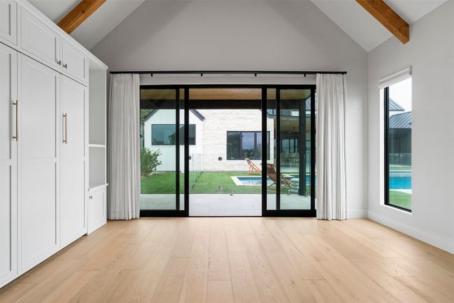 The casita’s large living/bedroom area offers direct access to the backyard, allowing you to step outside and enjoy the fresh air or seamlessly transition to outdoor relaxation at any time | Image 38