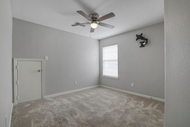 Empty room featuring carpet and a ceiling fan | Image 13